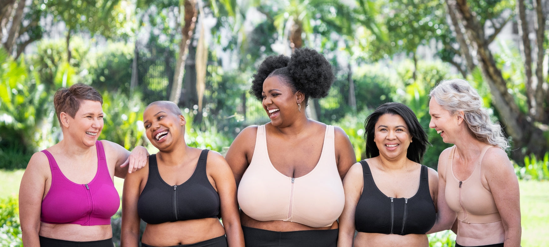 Women wearing front-zip compression bra outdoors, showing wire-free design for post-mastectomy recovery comfort.