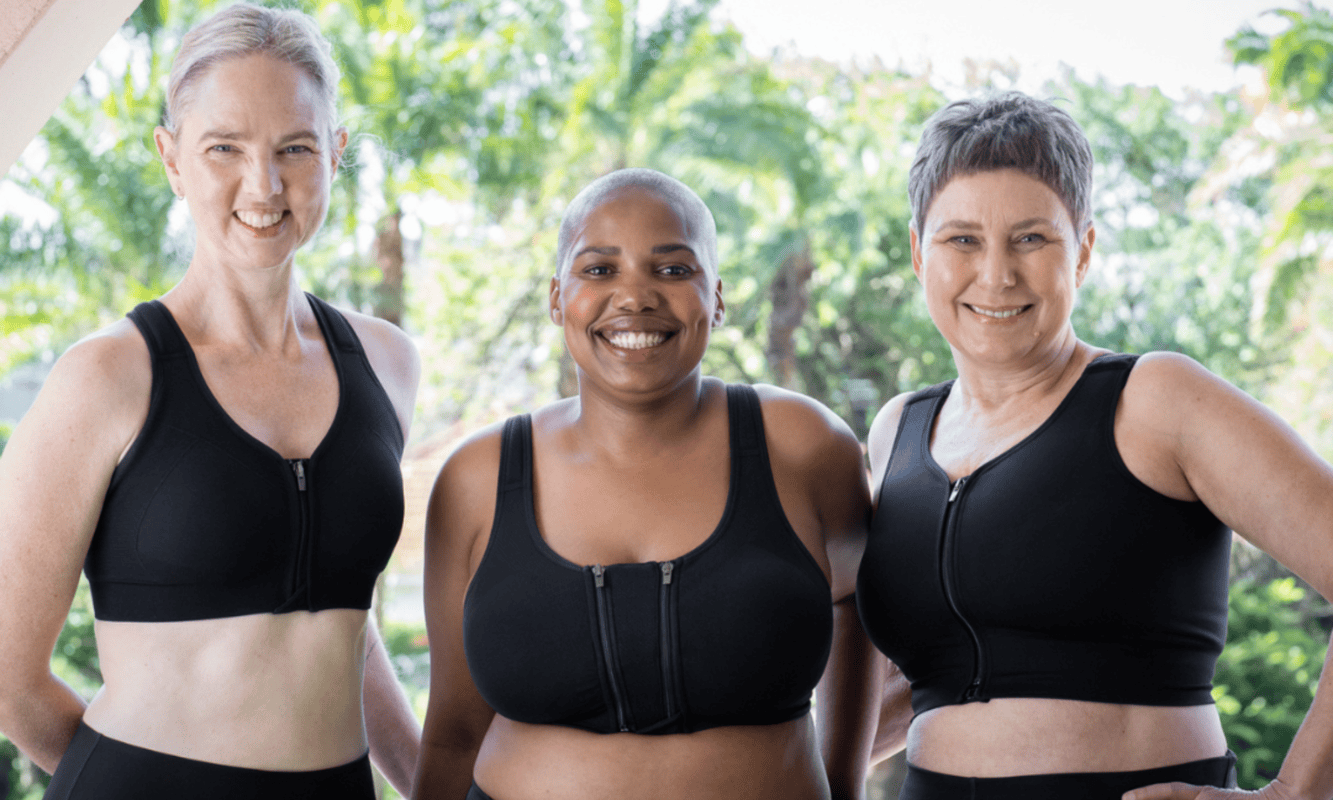 Women in black medical compression bras with front zipper design, highlighting supportive fit for different body types