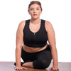 HuggerPRIMA Bra in No Moon Black being used as a yoga bra.  High to Medium Compression, Post-surgical Bra, Lymphedema Bra, Mastectomy Compression Bra, Surgical compression binder. For those who want more support and control, larger cup sizes, high impact activity support, higher compression sports bra.